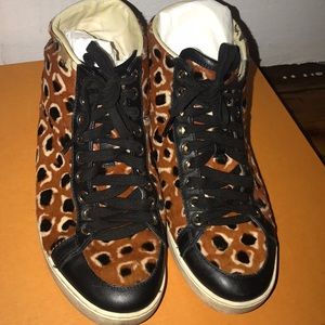 Gucci, pony hair leopard sneakers.